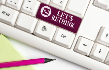 Word writing text Let S Rethink. Business concept for an Afterthought To Remember Reconsider Reevaluate White pc keyboard with empty note paper above white background key copy space. clipart