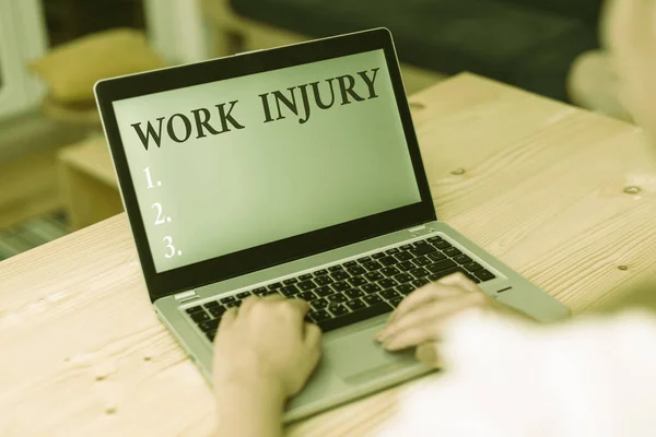 Word writing text Work Injury. Business concept for Accident in job Danger Unsecure conditions Hurt Trauma woman laptop computer smartphone mug office supplies technological devices.