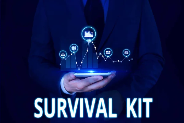 Text sign showing Survival Kit. Conceptual photo Emergency Equipment Collection of items to help someone Male human wear formal work suit presenting presentation using smart device.