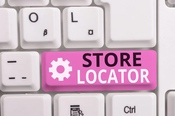 Writing note showing Store Locator. Business photo showcasing to know the address contact number and operating hours White pc keyboard with note paper above the white background. — Stock Photo, Image