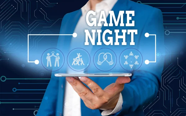 Escrita conceitual mostrando Game Night. Business photo text event in which people get together for the purpose of getting laid Masculino wear formal work suit presenting presentation smart device . — Fotografia de Stock