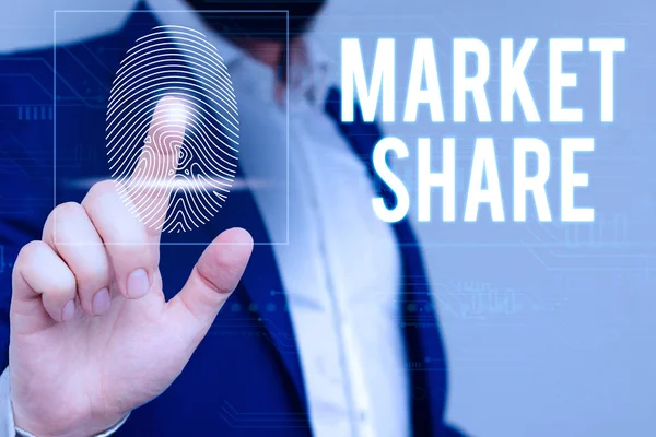 Writing note showing Market Share. Business photo showcasing The portion of a market controlled by a particular company Male wear formal work suit presenting presentation smart device.