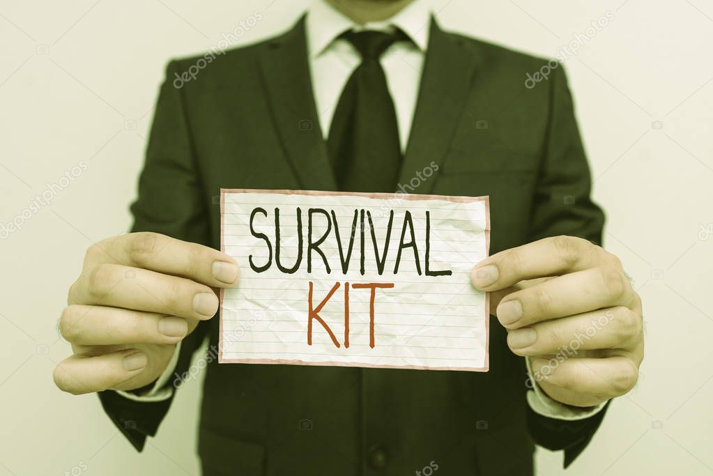 Handwriting text Survival Kit. Concept meaning Emergency Equipment Collection of items to help someone.