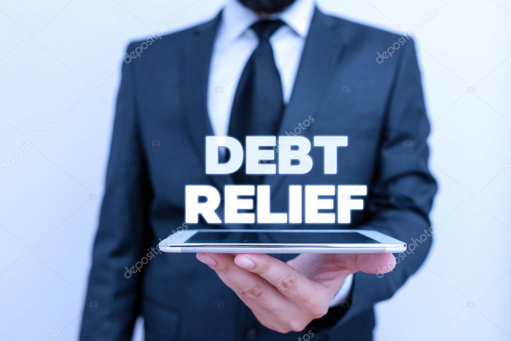 Writing note showing Debt Relief. Business photo showcasing partial or total remission of it especially those by countries.