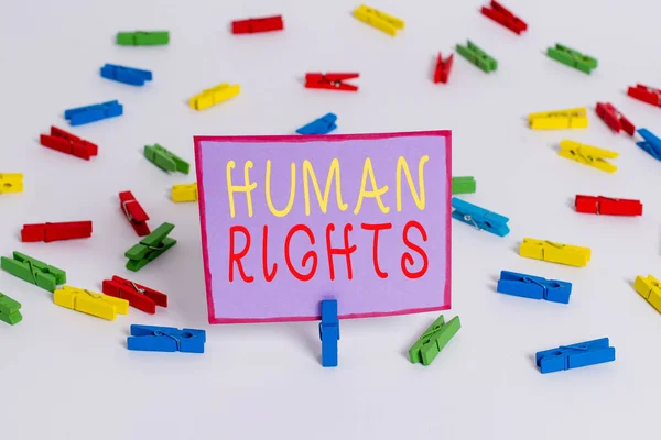 Conceptual hand writing showing Huanalysis Rights. Business photo text Moral Principles Standards Norms of a showing protected by Law Colored clothespin papers empty reminder white floor office. — Stock Photo, Image