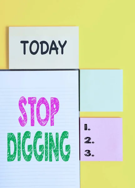 Word writing text Stop Digging. Business concept for Prevent Illegal excavation quarry Environment Conservation Colored empty papers with copy space on the yellow background table. — Stock Photo, Image