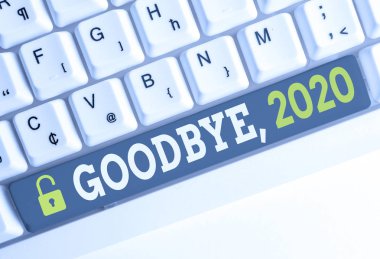 El yazısı metin Goodbye 2020. Kavram anlamı Yılbaşı Milestone Geçen Ay Kutlama Geçiş Beyaz pc klavye beyaz arka plan tuşu kopyalama alanı üzerinde boş not kağıdı ile.