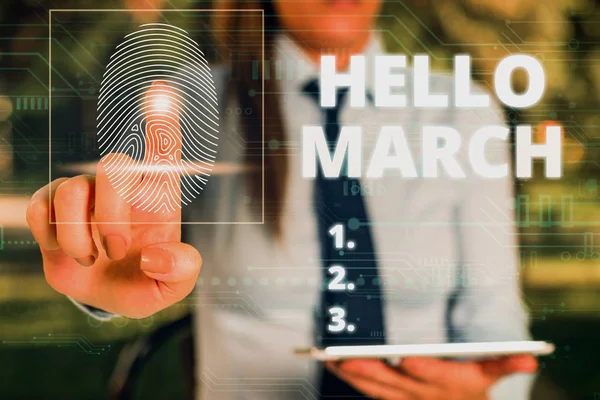 Word writing text Hello March. Business concept for musical composition usually in duple or quadruple with beat Woman wear formal work suit presenting presentation using smart device. — 스톡 사진