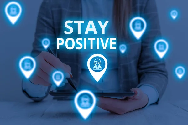 Text sign showing Stay Positive. Conceptual photo Engage in Uplifting Thoughts Be Optimistic and Real Woman wear formal work suit presenting presentation using smart device.