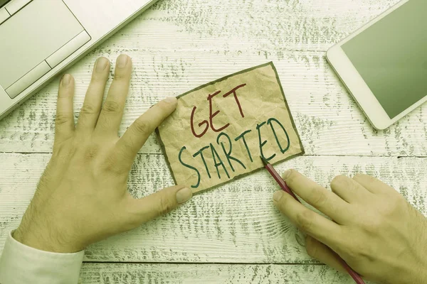 Text sign showing Get Started. Conceptual photo asking someone to begin task endeavour or process right now.