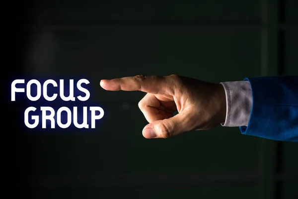 Handwriting text writing Focus Group. Concept meaning showing assembled to participate in discussion about something Isolated hand pointing with finger. Business concept pointing finger. — Stock Photo, Image