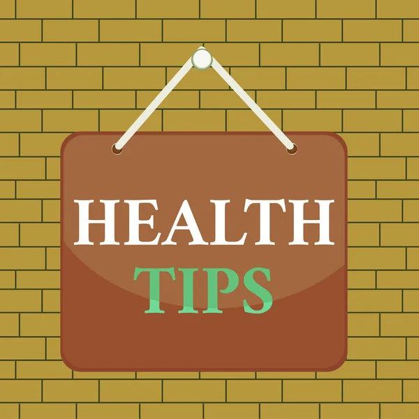 Text sign showing Health Tips. Conceptual photo state of complete physical mental and social well being Colored memo reminder empty board blank space attach background rectangle.