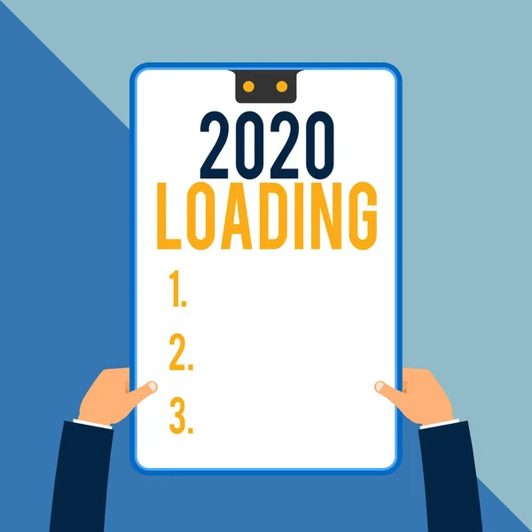 Word writing text 2020 Loading. Business concept for Advertising the upcoming year Forecasting the future event Two executive male hands holding electronic device geometrical background. — Stock Photo, Image