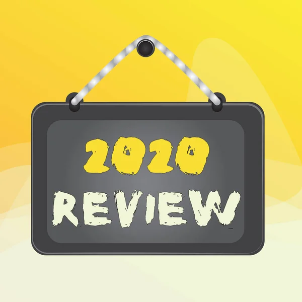 Writing note showing 2020 Review. Business photo showcasing seeing important events or actions that made previous year Board fixed nail frame colored background rectangle panel.