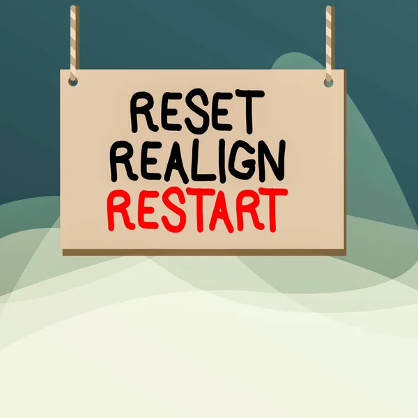 Writing note showing Reset Realign Restart. Business photo showcasing Life audit will help you put things in perspectives Wooden board wood empty frame fixed colorful striped string.