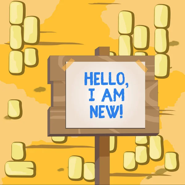 Word writing text Hello I Am New. Business concept for introducing oneself in a group as fresh worker or student Wood plank wooden stick pole paper note attached adhesive tape empty space. — Stock Photo, Image
