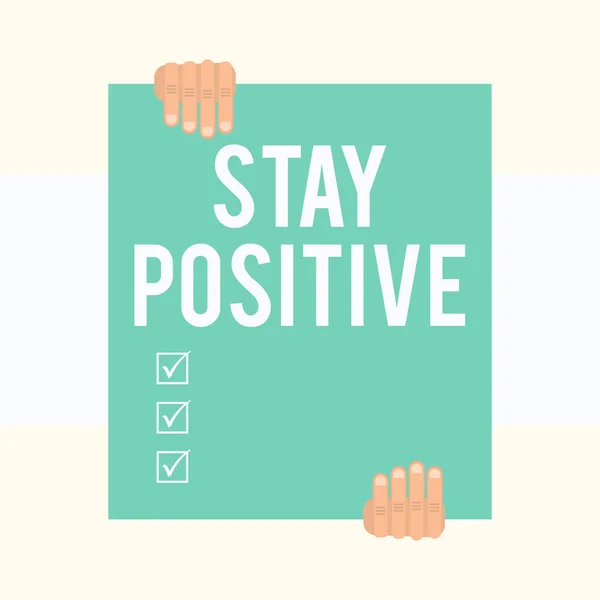 Writing note showing Stay Positive. Business photo showcasing Engage in Uplifting Thoughts Be Optimistic and Real Two hands holding big blank rectangle up down Geometrical background. — стокове фото