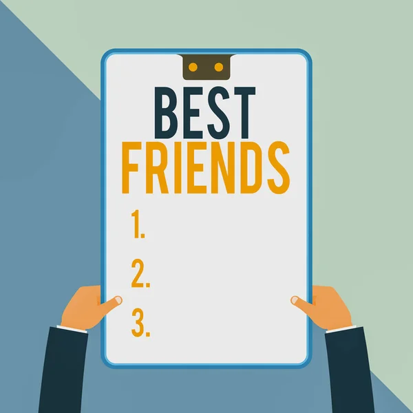 Word writing text Best Friends. Business concept for A demonstrating you value above other demonstratings Forever buddies Two executive male hands holding electronic device geometrical background.