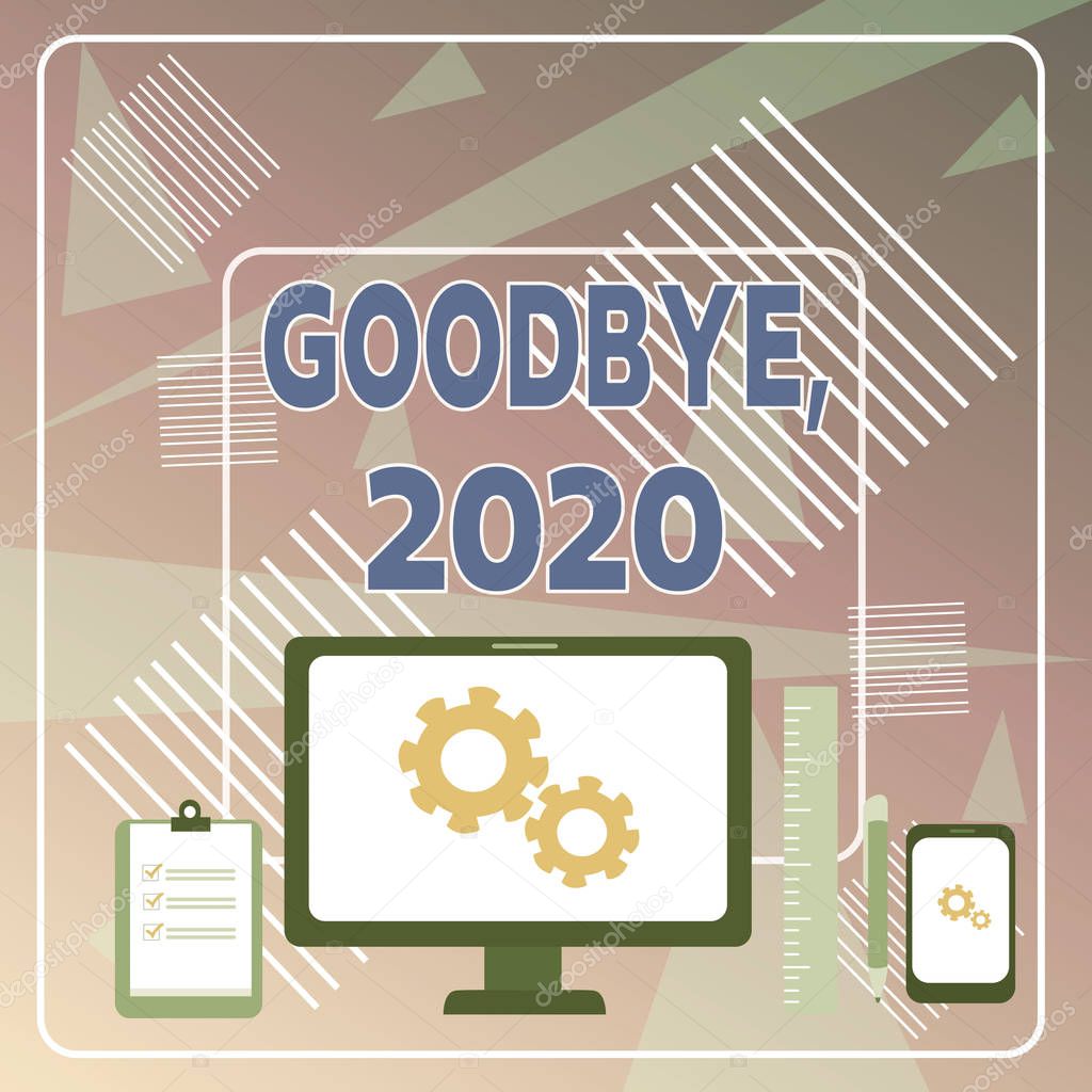 Word writing text Goodbye 2020. Business concept for New Year Eve Milestone Last Month Celebration Transition Business Concept PC Monitor Mobile Device Clipboard Ruler Ballpoint Pen.