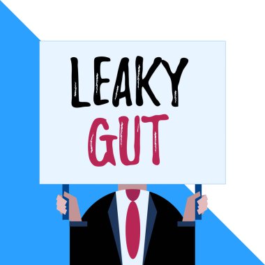 Leaky Gut gösteren kavramsal el yazısı. İş fotoğraf vitrin hangi ince bağırsak astar hasarlı Bir durum Adam göğüs koyu takım elbise kravat büyük dikdörtgen tutan yüz giyinmiş.