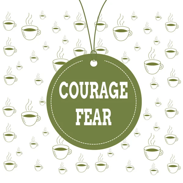 Writing note showing Courage Fear. Business photo showcasing quality of mind that enables a demonstrating to face difficulty Label string round empty tag colorful background small shape.