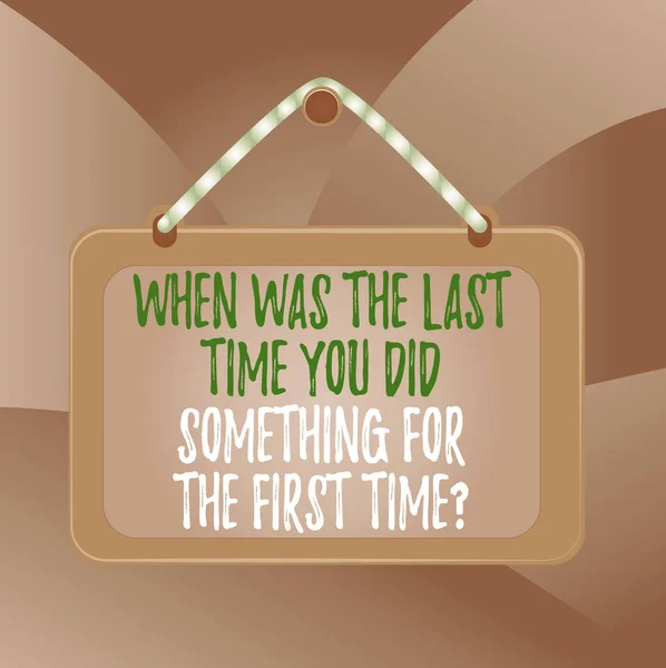 Handwriting text When Was The Last Time You Dids. Concept meaning When Was The Last Time You Did Something For The First Time Question Board fixed nail frame string striped colored background