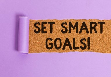 Set Smart Goals'ı gösteren kavramsal el yazısı. Fikirlerinizi netleştirmek için iş fotoğrafı vitrin listesi odak çabaları akıllıca zaman kullanın.