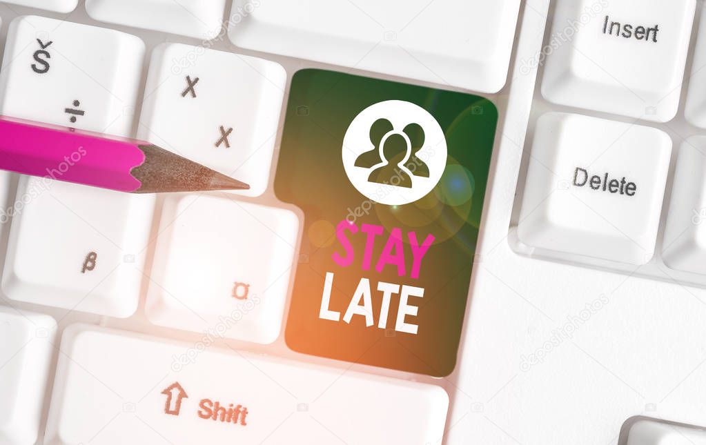 Text sign showing Stay Late. Conceptual photo A routine in which a demonstrating goes to somewhere out of time White pc keyboard with empty note paper above white background key copy space.