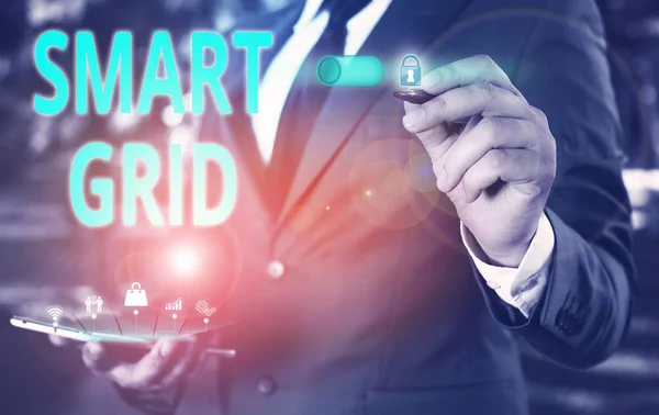 Text sign showing Smart Grid. Conceptual photo includes of operational and energy measures including meters Male human wear formal work suit presenting presentation using smart device. — Stockfoto