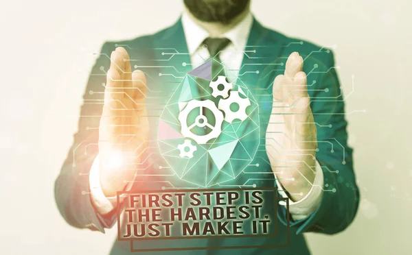 Handwriting text writing First Step Is The Hardest Just Make It. Concept meaning dont give up on final route Male human wear formal work suit presenting presentation using smart device. — Stock Photo, Image