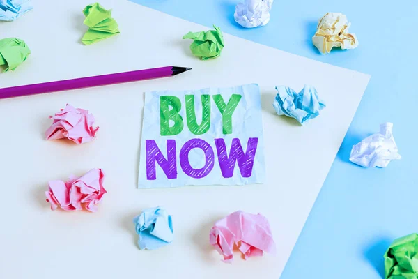 Handwriting text Buy Now. Concept meaning asking someone to purchase your product Provide good Discount Colored crumpled papers empty reminder blue yellow background clothespin. — Stock Photo, Image
