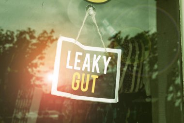 Text sign showing Leaky Gut. Conceptual photo A condition in which the lining of small intestine is damaged Empty black board with copy space for advertising. Blank dark board. clipart