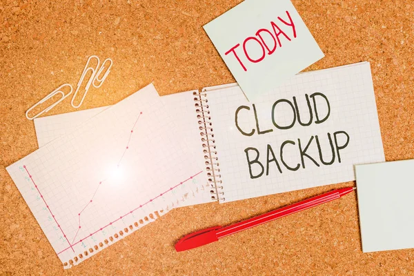 Writing note showing Cloud Backup. Business photo showcasing enable customers to remotely access the provider s is services Desk notebook paper office paperboard study supplies chart.