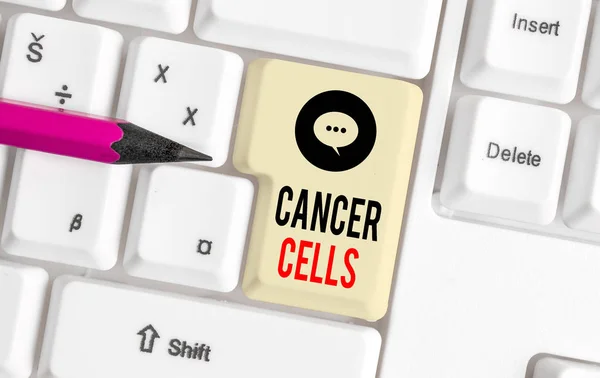 Writing note showing Cancer Cells. Business photo showcasing forming solid tumors or flooding the blood with abnormal cells White pc keyboard with note paper above the white background. — Stock Photo, Image