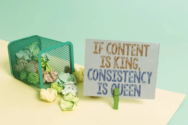 Word writing text If Content Is King Consistency Is Queen. Business concept for Marketing strategies Persuasion Trash bin crumpled paper clothespin empty reminder office supplies tipped.