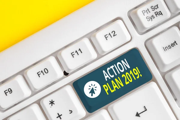 Word writing text Action Plan 2019. Business concept for proposed strategy or course of actions for current year White pc keyboard with empty note paper above white background key copy space.