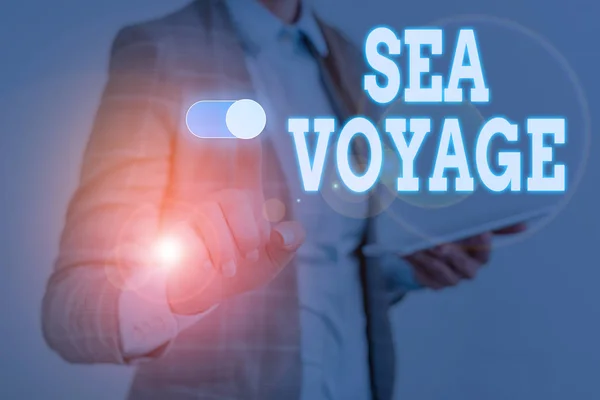 Writing note showing Sea Voyage. Business photo showcasing riding on boat through oceans usually for coast countries Woman wear formal work suit presenting presentation using smart device.