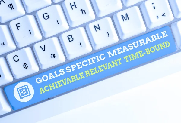 Word writing text Goals Specif Measureable AC. Business concept for Goals Specific Measurable Achievable Relevant Time Bound White pc keyboard with empty note paper above white background key copy — Stock Photo, Image