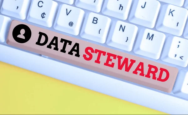 Text sign showing Data Steward. Conceptual photo responsible for utilizing an organization s is data governance White pc keyboard with empty note paper above white background key copy space.