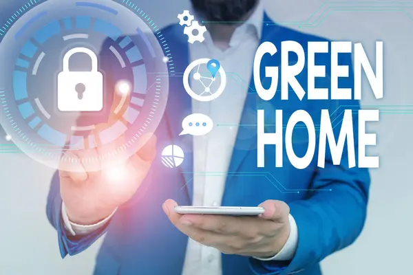 Word writing text Green Home. Business concept for An area filled with plants and trees where you can relax Male human wear formal work suit presenting presentation using smart device. — Stock Photo, Image