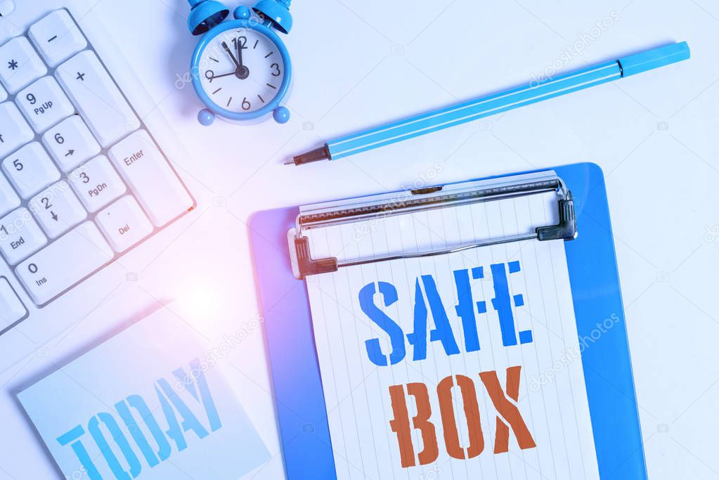 Writing note showing Safe Box. Business photo showcasing A small structure where you can keep important or valuable things Flat lay above table with clock pc keyboard and copy space note paper.