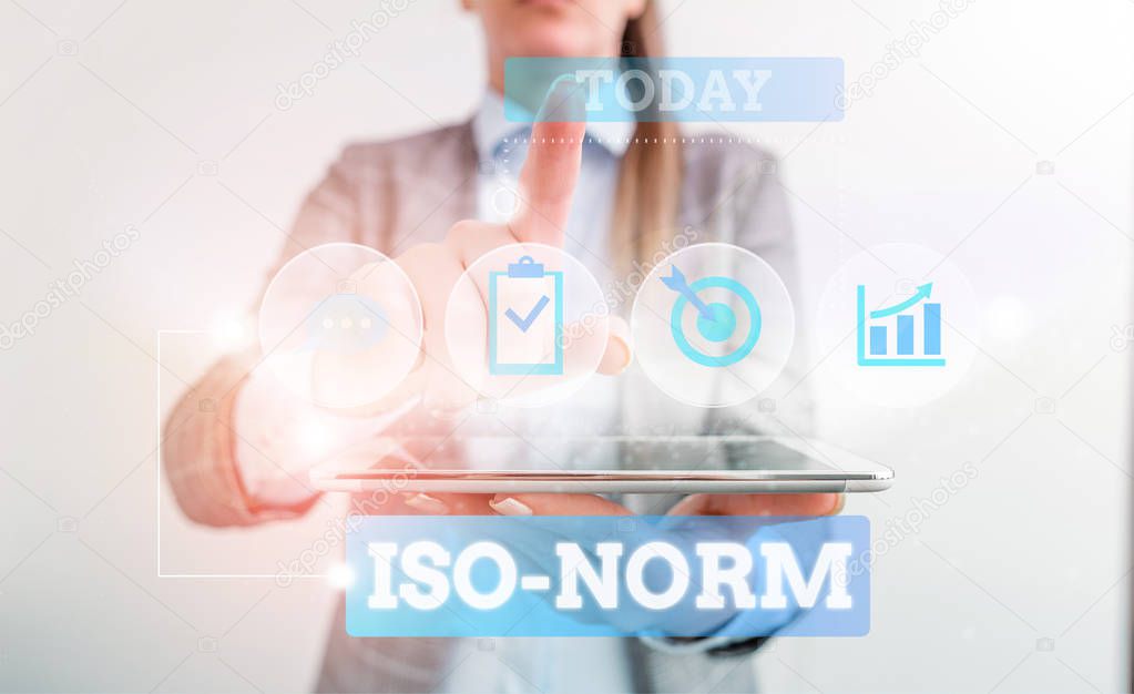 Text sign showing Iso Norm. Conceptual photo An accepted standard or a way of doing things most showing agreed Female human wear formal work suit presenting presentation use smart device.