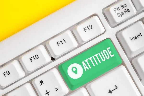 Text sign showing Attitude. Conceptual photo settled way of thinking or feeling about something Personality White pc keyboard with empty note paper above white background key copy space.