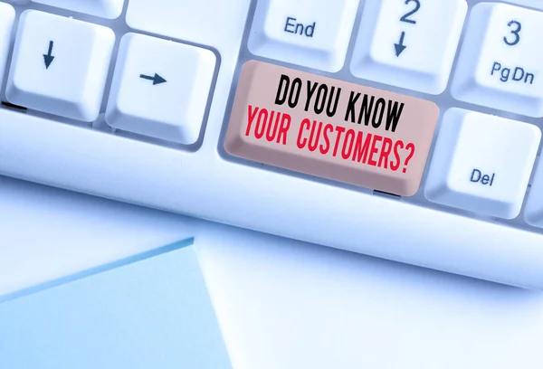 Writing note showing Do You Know Your Customers Question. Business photo showcasing having a great background about clients White pc keyboard with note paper above the white background. — Stock Photo, Image