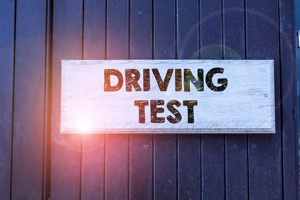 Writing note showing Driving Test. Business photo showcasing procedure to test a demonstrating s is ability to drive a motor vehicle Empty white board for advertising. White space for text adding.