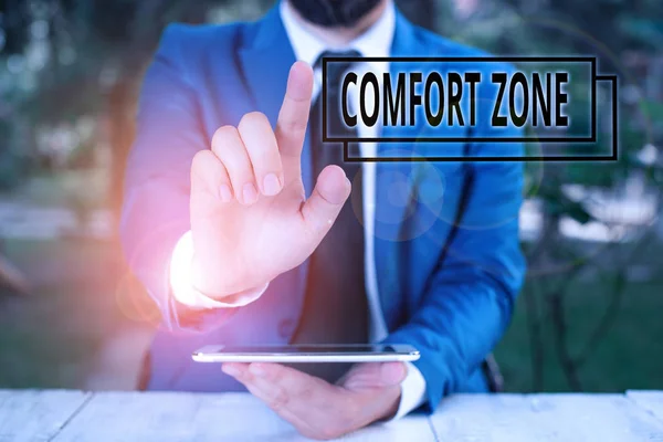 Handwriting text writing Comfort Zone. Concept meaning place or situation where one feels safe and without stress Businessman with pointing finger in front of him.