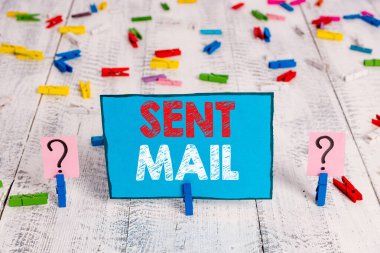 Word writing text Sent Mail. Business concept for Event where a letter to be taken somewhere or goes to the receiver Scribbled and crumbling sheet with paper clips placed on the wooden table.