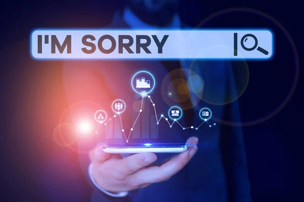 Conceptual hand writing showing I M Sorry. Business photo showcasing Toask for forgiveness to someone you unintensionaly hurt Male wear formal suit presenting presentation smart device. — Stock Photo, Image