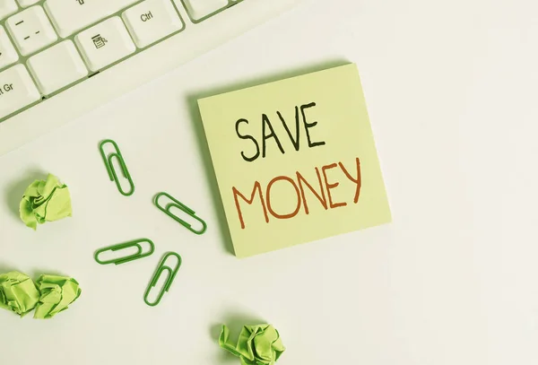 Handwriting text Save Money. Concept meaning store some of your cash every month to use them sometime later Square empty green note paper with pencil on the white background and pc keyboard. — Stock Photo, Image
