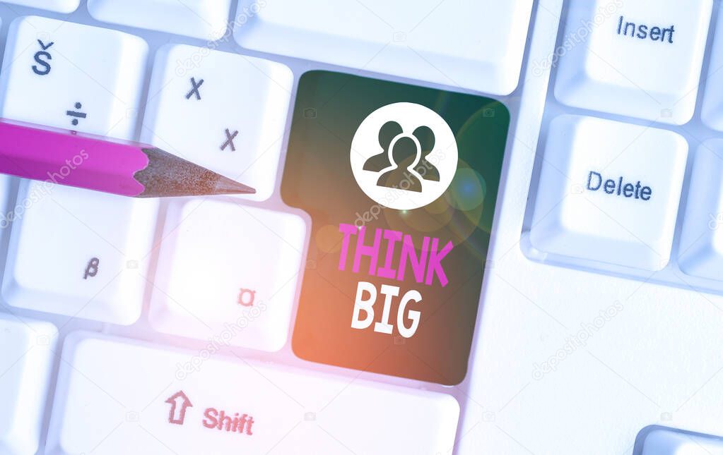 Text sign showing Think Big. Conceptual photo To plan for something high value for ones self or for preparation White pc keyboard with empty note paper above white background key copy space.